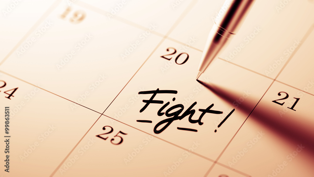 Closeup of a personal agenda setting an important date written w Closeup of a personal agenda setting an important date written w
