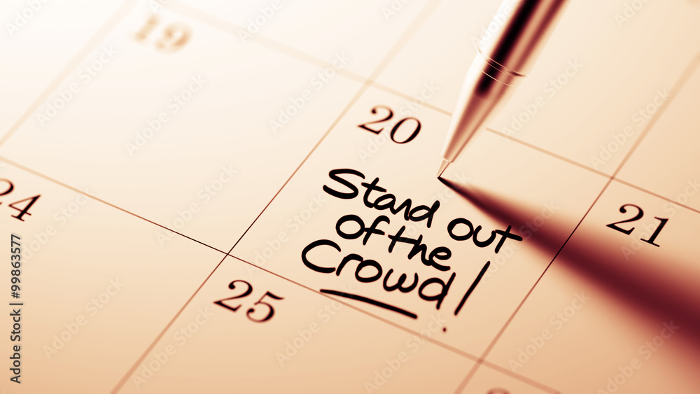 Closeup of a personal agenda setting an important date written w Closeup of a personal agenda setting an important date written w