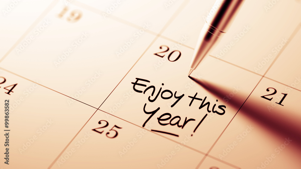 Closeup of a personal agenda setting an important date written w Closeup of a personal agenda setting an important date written w