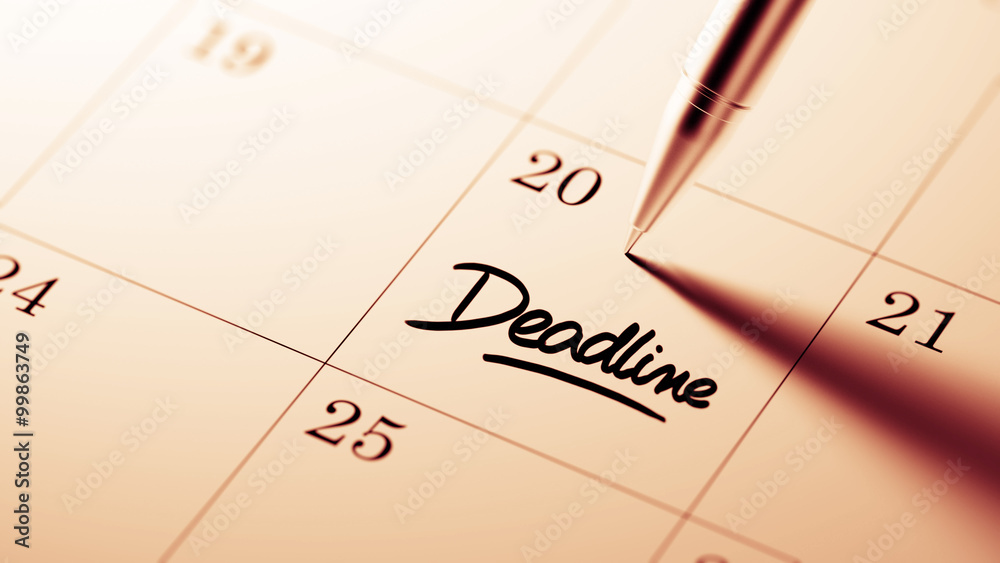 Closeup of a personal agenda setting an important date written w Closeup of a personal agenda setting an important date written w