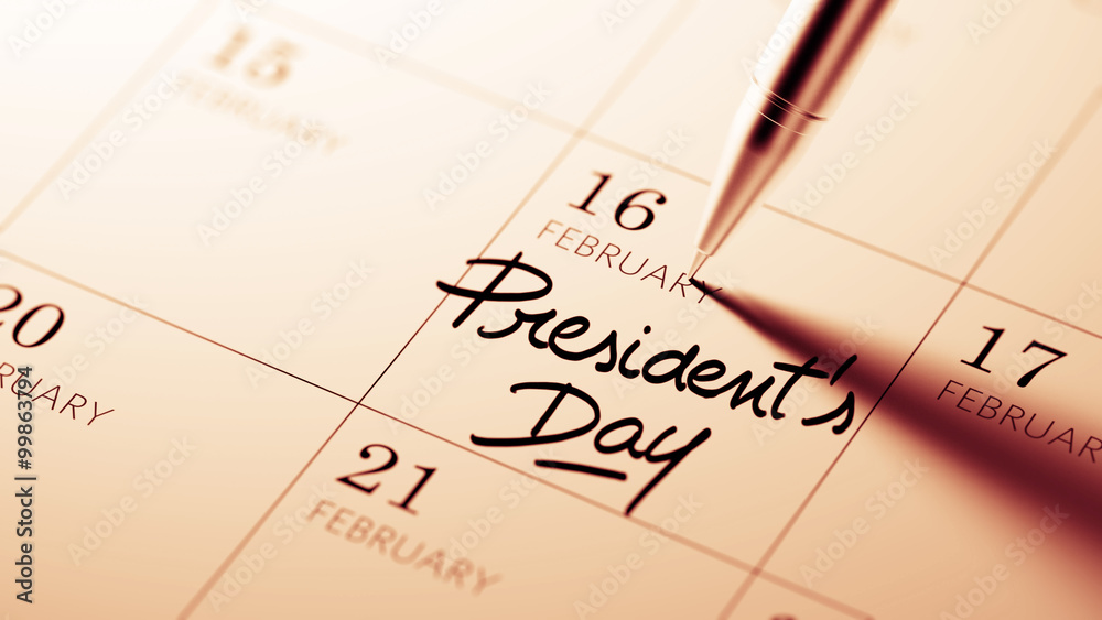 Closeup of a personal agenda setting an important date written w Closeup of a personal agenda setting an important date written w