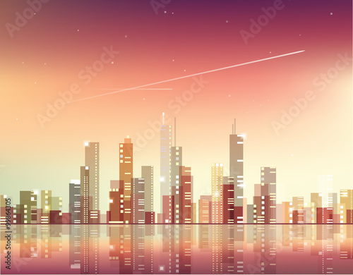 Abstract city skyline with lighted skyscrapers on a red night sky reflecting in the water