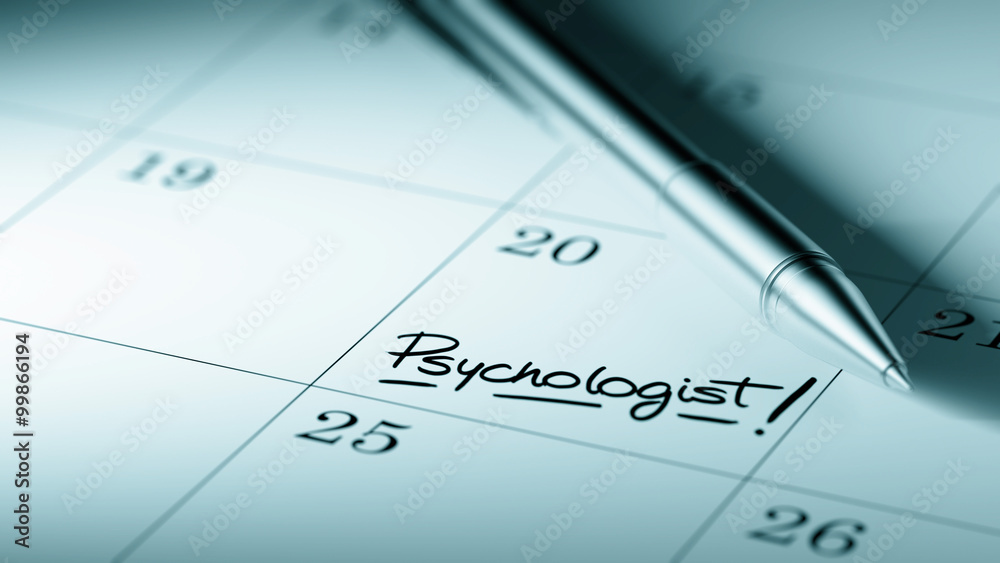 Closeup of a personal agenda setting an important date written w Closeup of a personal agenda setting an important date written w