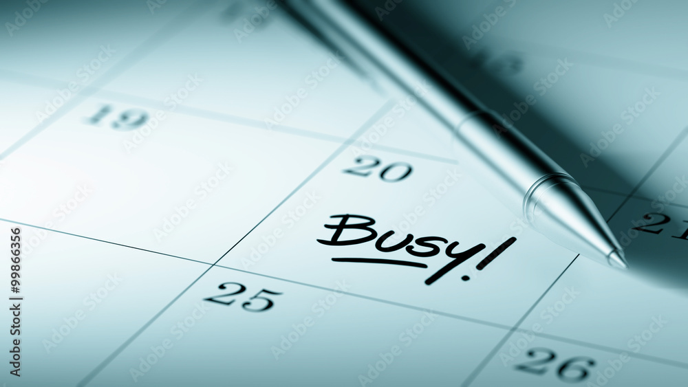 Closeup of a personal agenda setting an important date written w Closeup of a personal agenda setting an important date written w