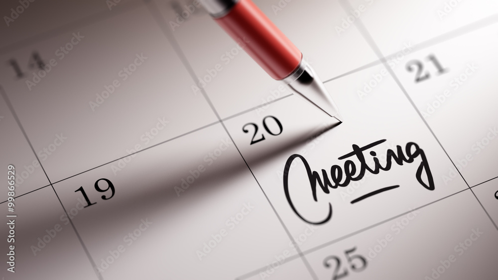 Closeup of a personal agenda setting an important date written w Closeup of a personal agenda setting an important date written w