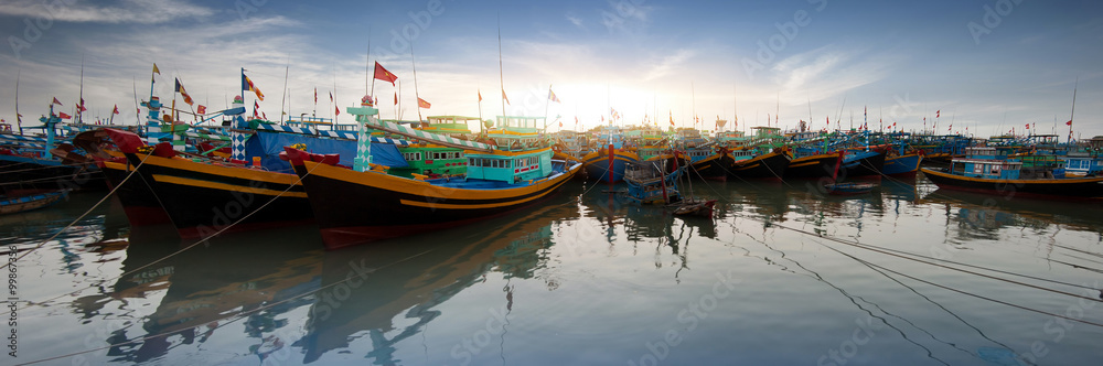 Port with many boats and ships in Phan Tiet in Vietnam
