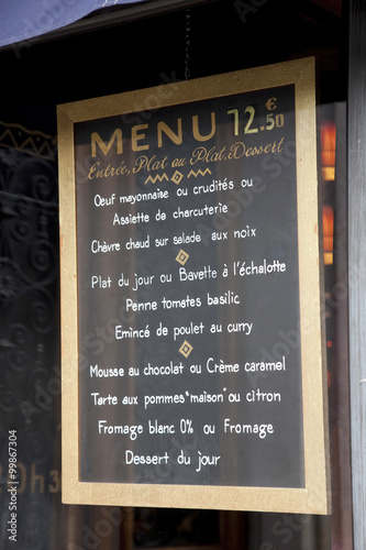 French Menu Hanging in Restaurant in Paris, France