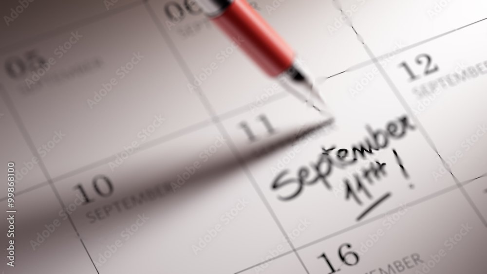 Closeup of a personal agenda setting an important date written w Closeup of a personal agenda setting an important date written w