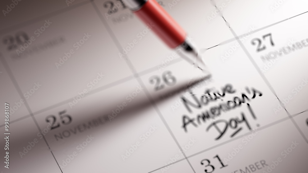Closeup of a personal agenda setting an important date written w Closeup of a personal agenda setting an important date written w