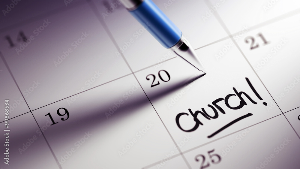 Closeup of a personal agenda setting an important date written w Closeup of a personal agenda setting an important date written w