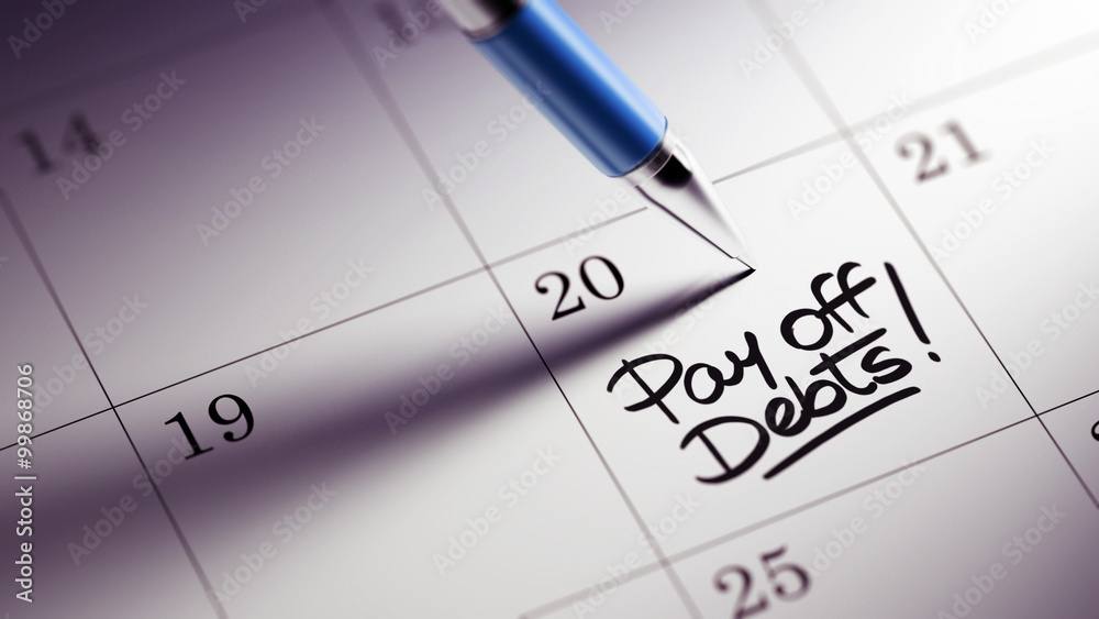 Closeup of a personal agenda setting an important date written w Closeup of a personal agenda setting an important date written w