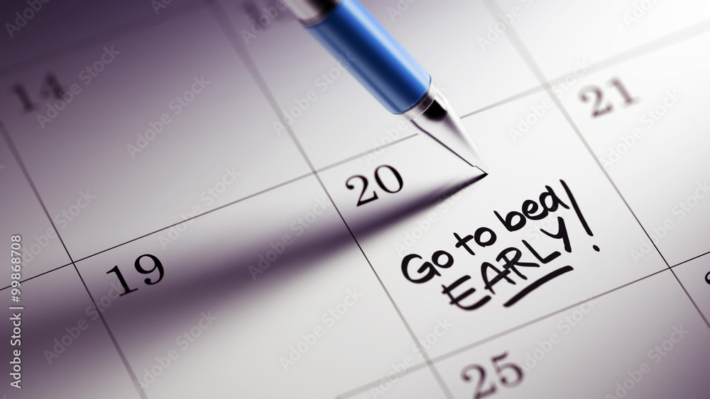 Closeup of a personal agenda setting an important date written w Closeup of a personal agenda setting an important date written w