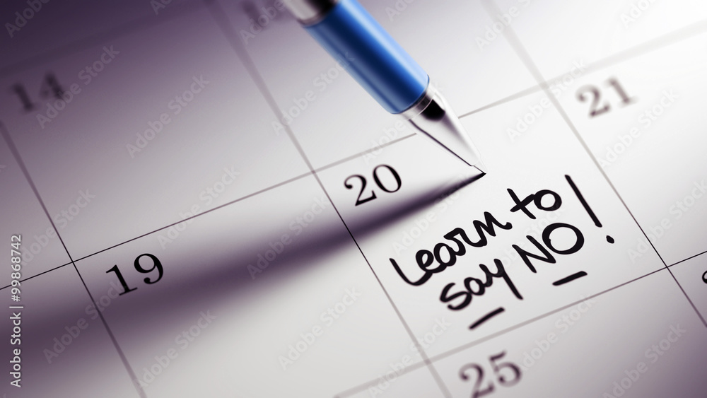 Closeup of a personal agenda setting an important date written w Closeup of a personal agenda setting an important date written w