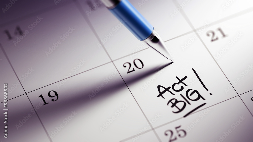 Closeup of a personal agenda setting an important date written w Closeup of a personal agenda setting an important date written w