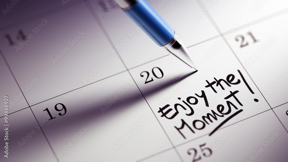 Closeup of a personal agenda setting an important date written w Closeup of a personal agenda setting an important date written w