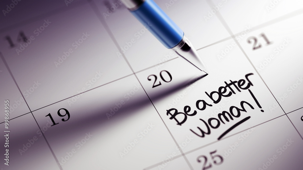 Closeup of a personal agenda setting an important date written w Closeup of a personal agenda setting an important date written w