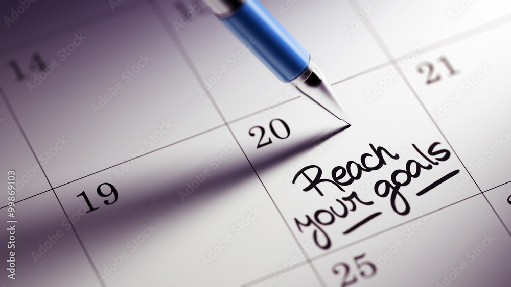 Closeup of a personal agenda setting an important date written w Closeup of a personal agenda setting an important date written w