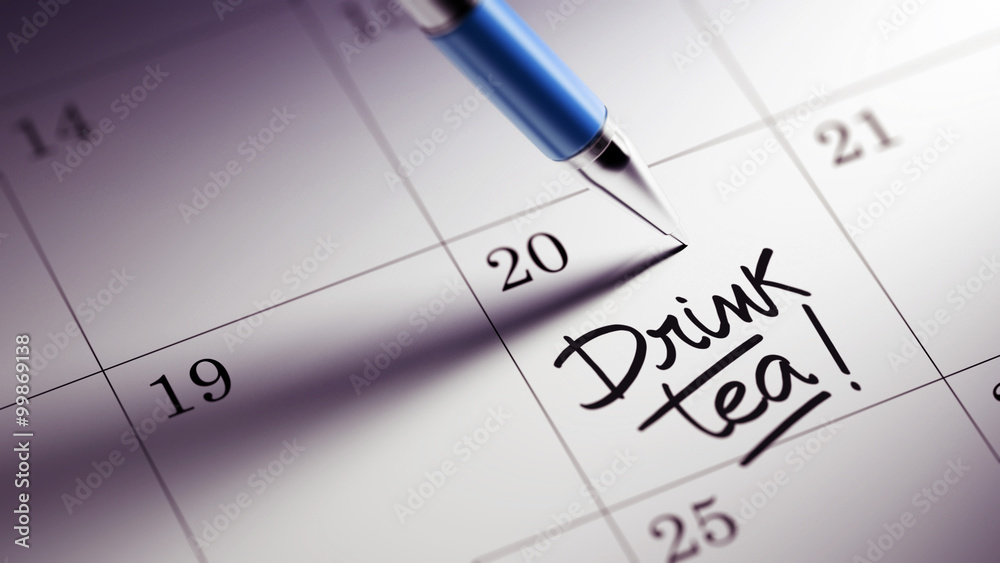 Closeup of a personal agenda setting an important date written w Closeup of a personal agenda setting an important date written w