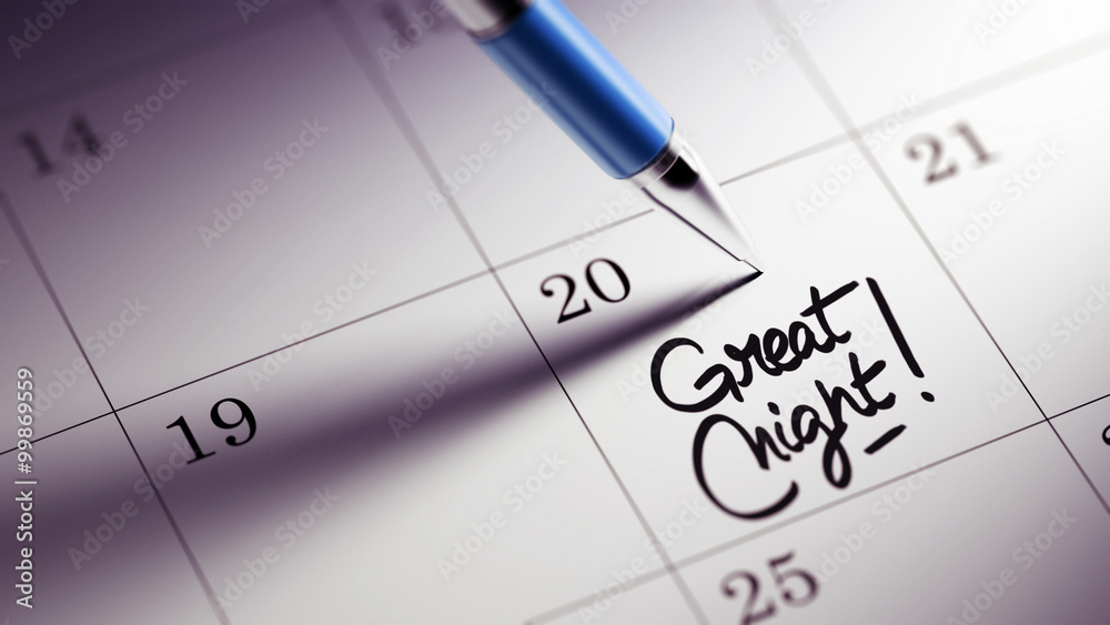 Closeup of a personal agenda setting an important date written w Closeup of a personal agenda setting an important date written w