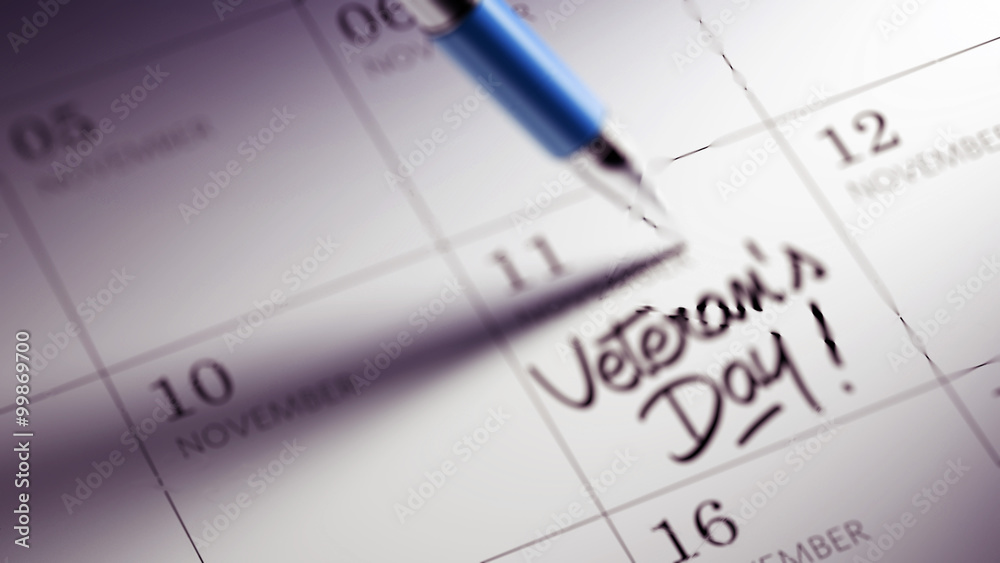 Closeup of a personal agenda setting an important date written w Closeup of a personal agenda setting an important date written w