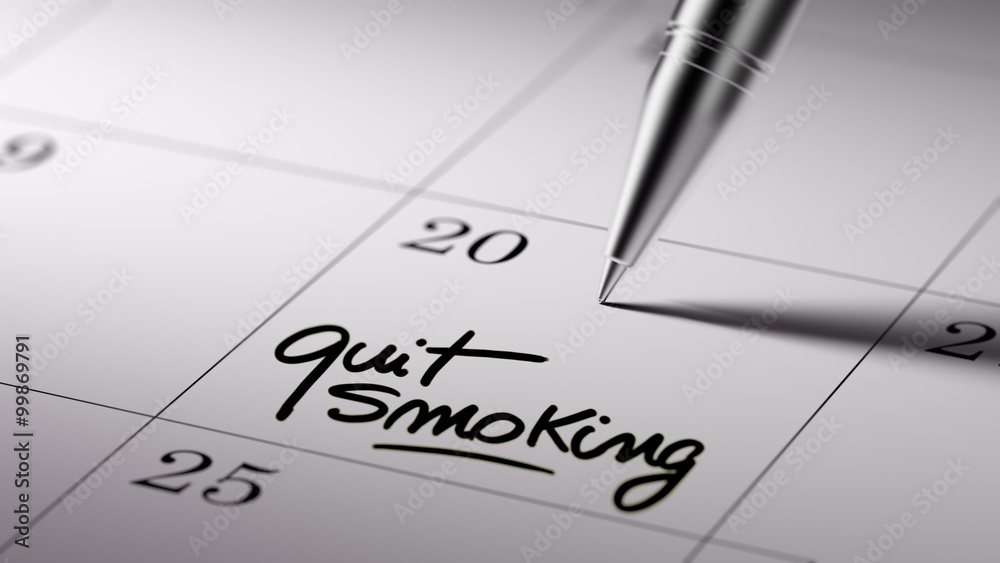 Closeup of a personal agenda setting an important date written w Closeup of a personal agenda setting an important date written w