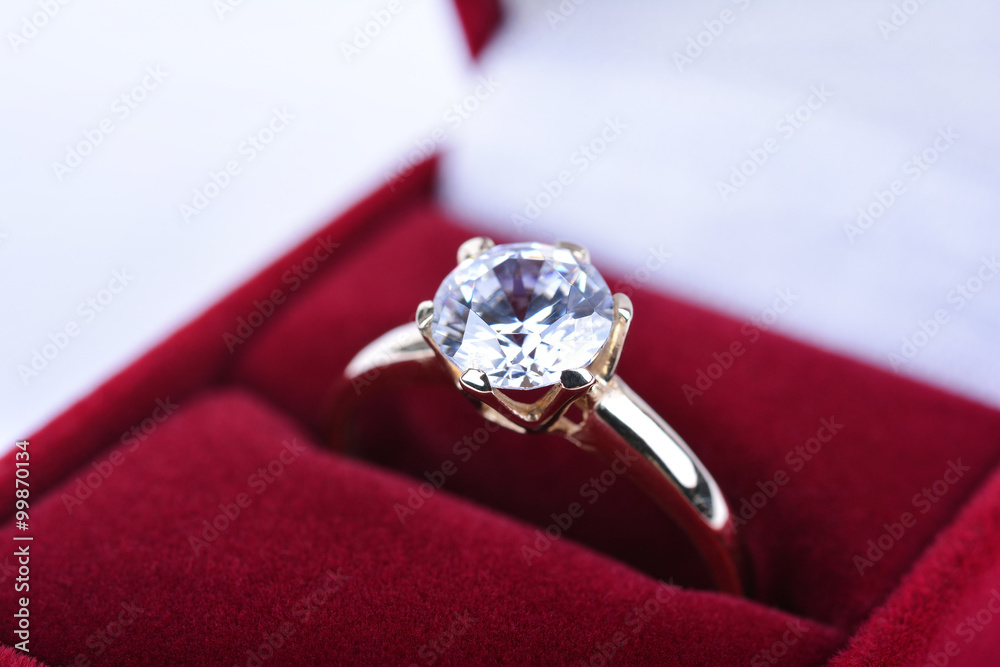 Wedding ring in a red gift box Wedding ring in a red gift box