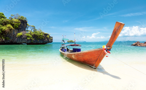 Summer day on exotic beach of tropical island. Thailand tourism landscape