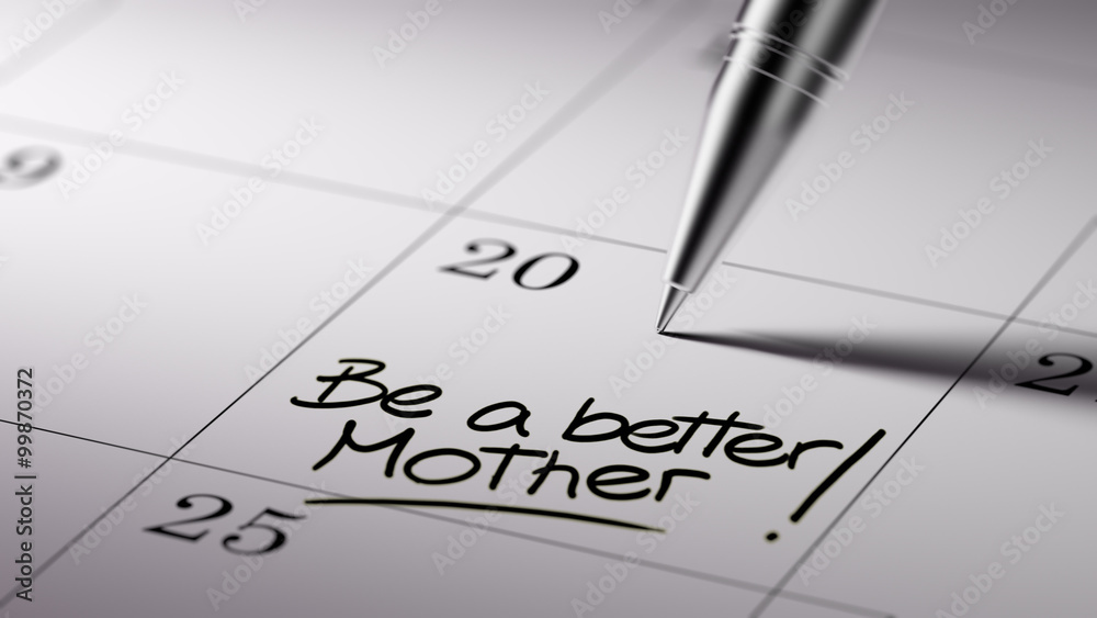 Closeup of a personal agenda setting an important date written w Closeup of a personal agenda setting an important date written w