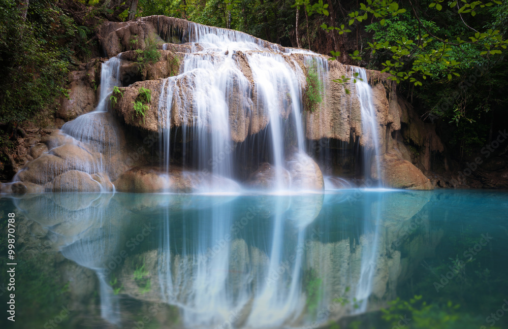 Fototapeta premium Thailand nature background. Beautiful waterfall in rainforest