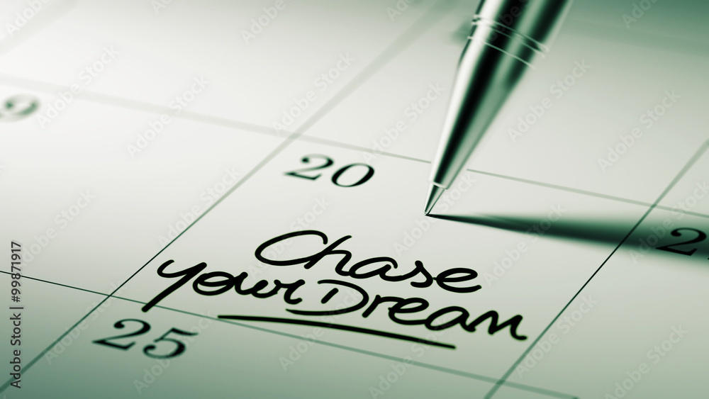 Closeup of a personal agenda setting an important date written w Closeup of a personal agenda setting an important date written w