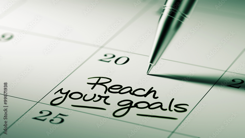 Closeup of a personal agenda setting an important date written w Closeup of a personal agenda setting an important date written w