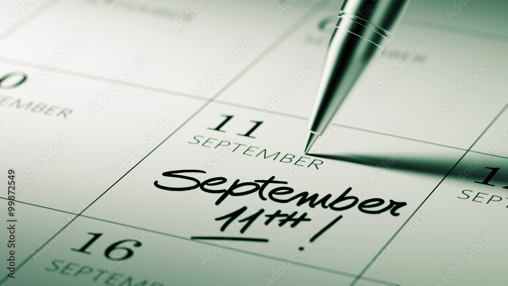 Closeup of a personal agenda setting an important date written w Closeup of a personal agenda setting an important date written w