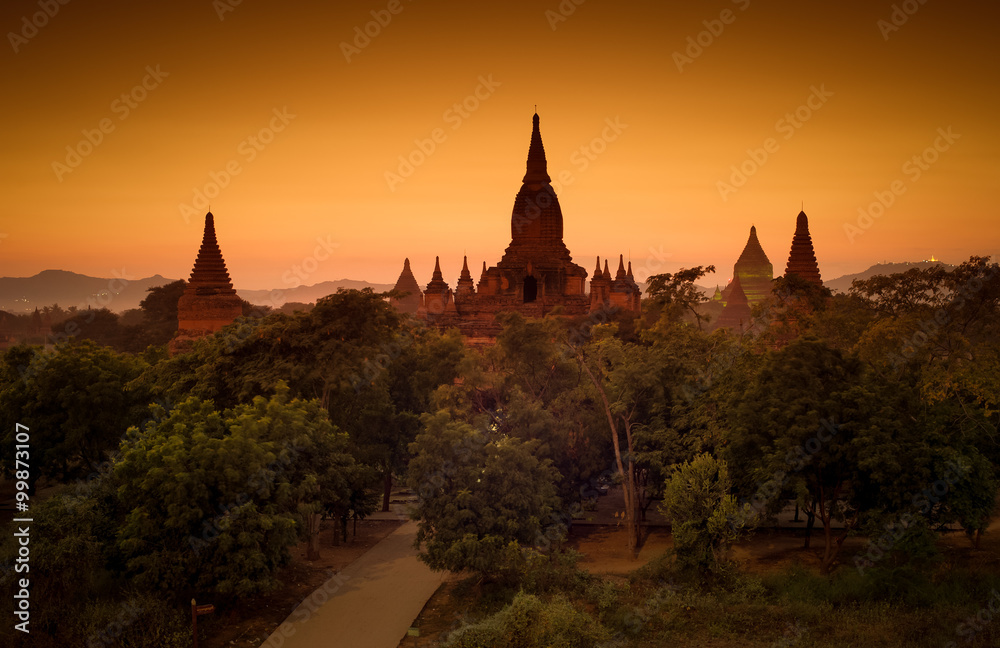 Ancient Buddhist temples in Bagan Myanmar at sunset