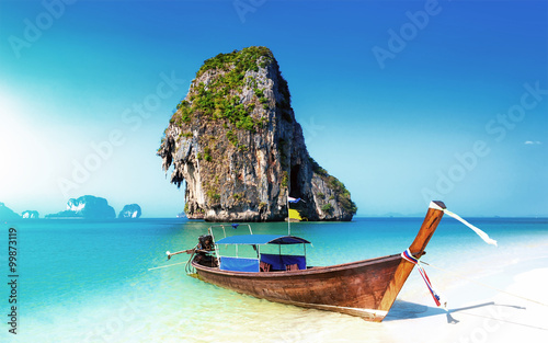 Scenic adventure background of amazing white sand beach on coast of tropical island in Thailand