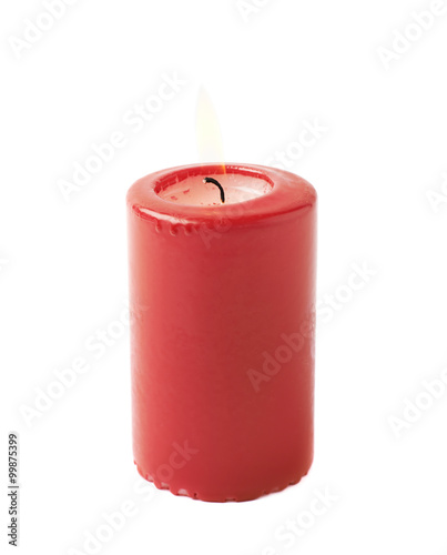 Burning red candle isolated