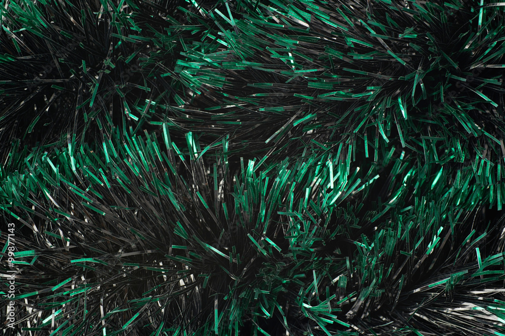 Fototapeta premium Surface covered with tinsel garland