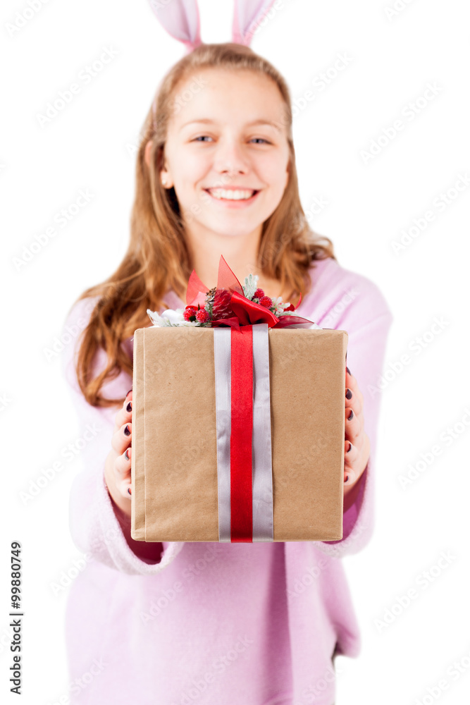Present box in girl hands isolated, selective focus Present box in girl hands isolated, selective focus