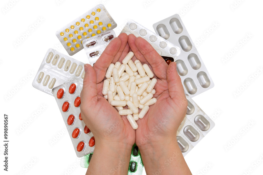 Obraz premium Pills in hands and bags of drugs on isolated background