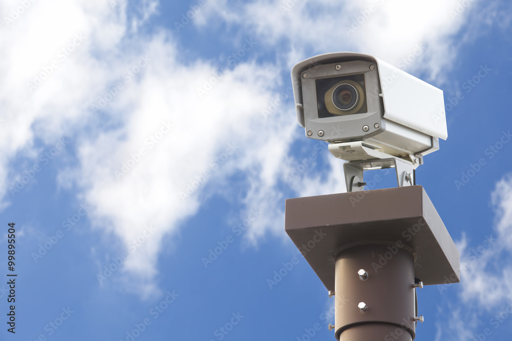 video camera security system and nice blue sky