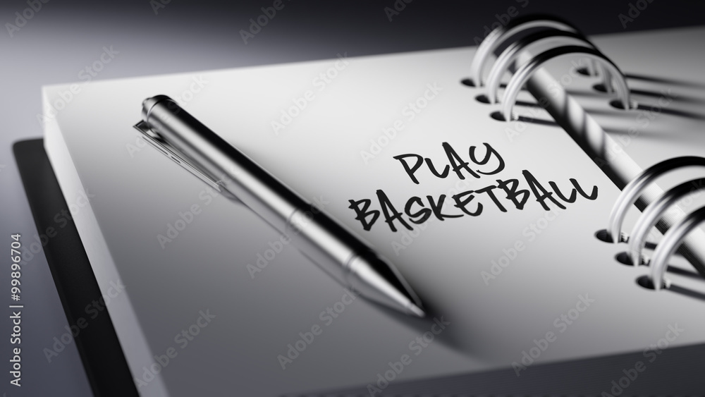 Closeup of a personal agenda setting an important date writing w Closeup of a personal agenda setting an important date writing w