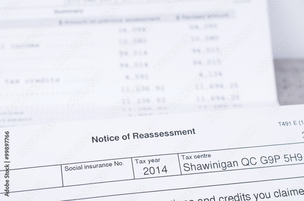 Canadian Tax Notice of reassessment with calculation sheet in th Canadian Tax Notice of reassessment with calculation sheet in th