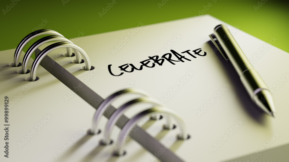 Closeup of a personal agenda setting an important date writing w Closeup of a personal agenda setting an important date writing w