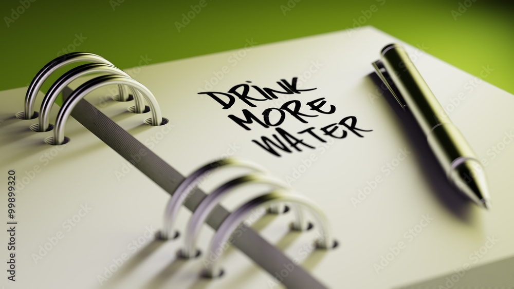 Closeup of a personal agenda setting an important date writing w Closeup of a personal agenda setting an important date writing w
