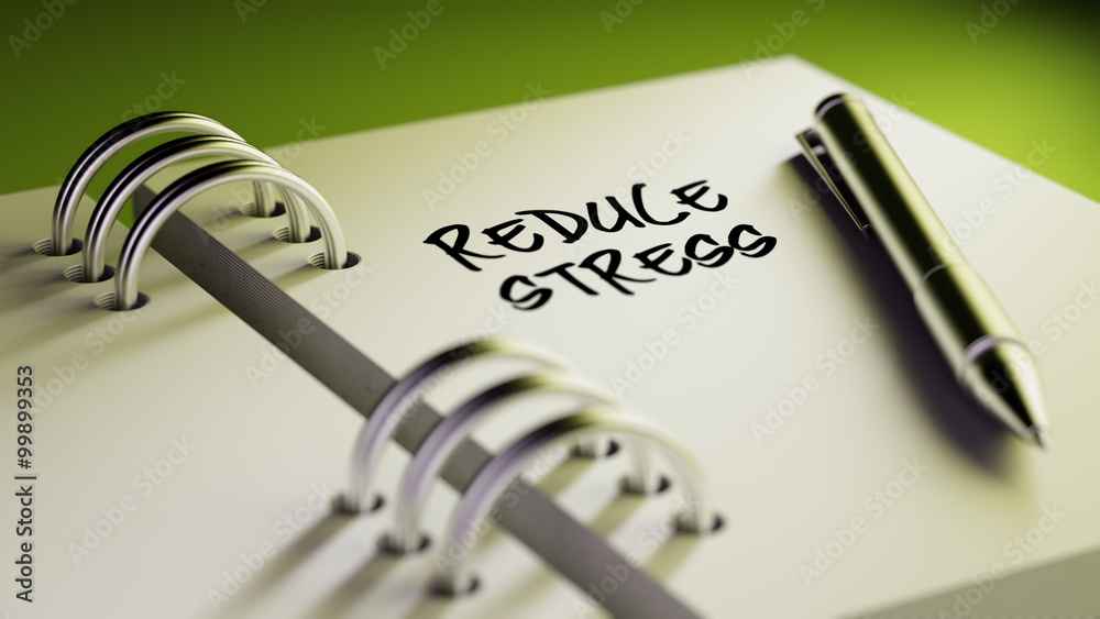 Closeup of a personal agenda setting an important date writing w Closeup of a personal agenda setting an important date writing w