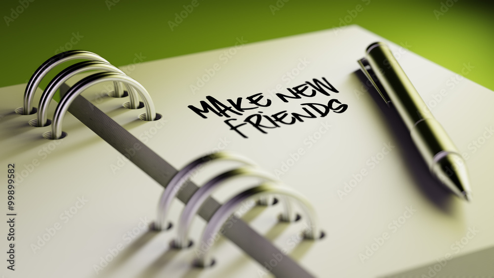 Closeup of a personal agenda setting an important date writing w Closeup of a personal agenda setting an important date writing w