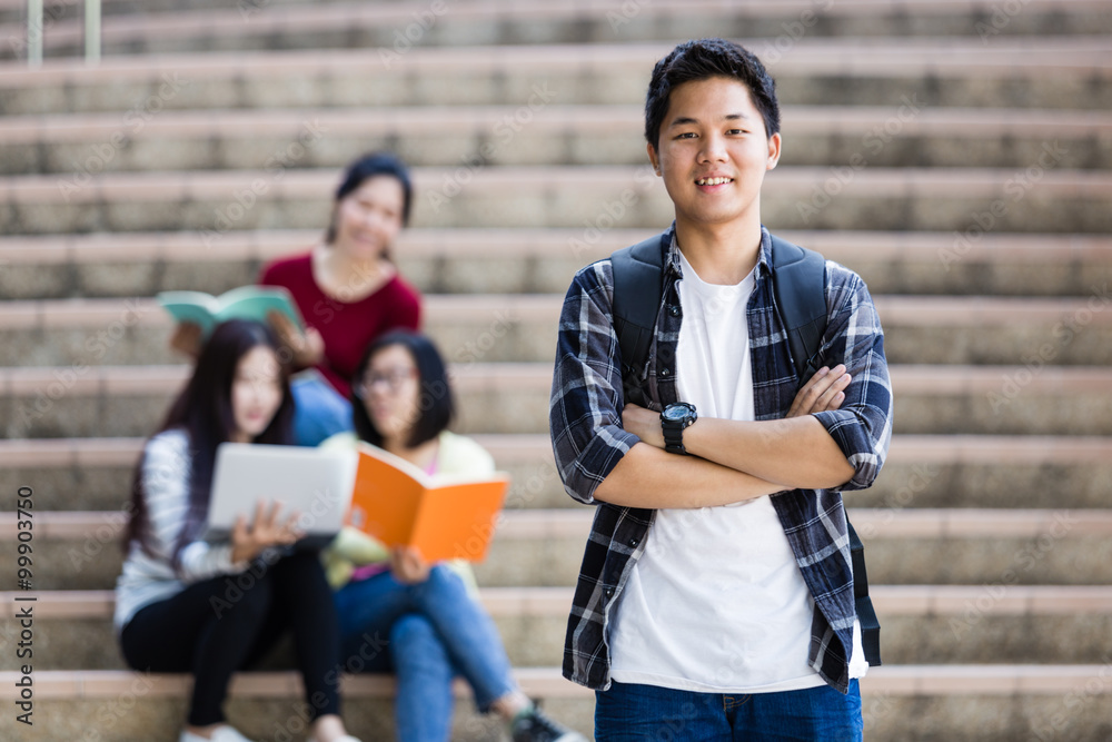 Obraz premium group of happy teen high school students outdoors