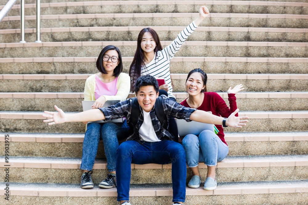 Fototapeta premium group of happy teen high school students outdoors