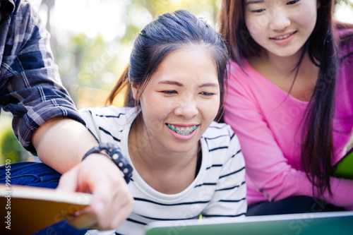 Group of university students having fun outdoors