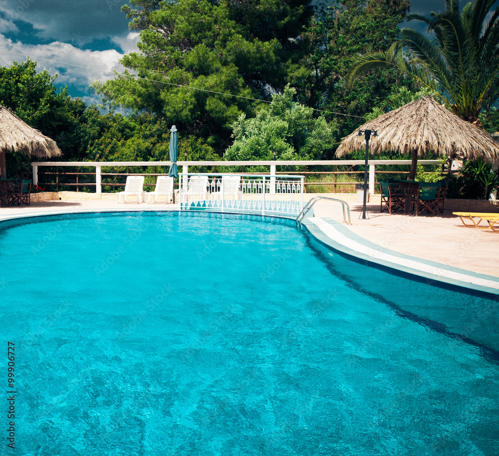 Obraz premium Swimming pool with stair at hotel