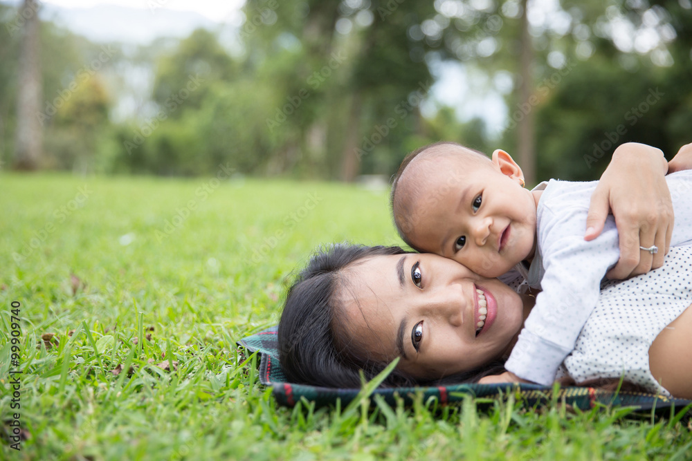 mother and her baby having fun together outdoor mother and her baby having fun together outdoor